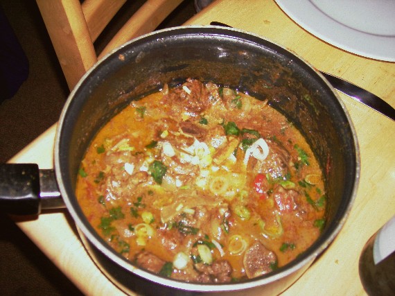 curried goat in pot