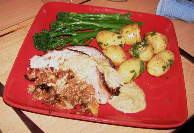 pork with pear and walnuts, stilton sauce, potatoes and brocolli