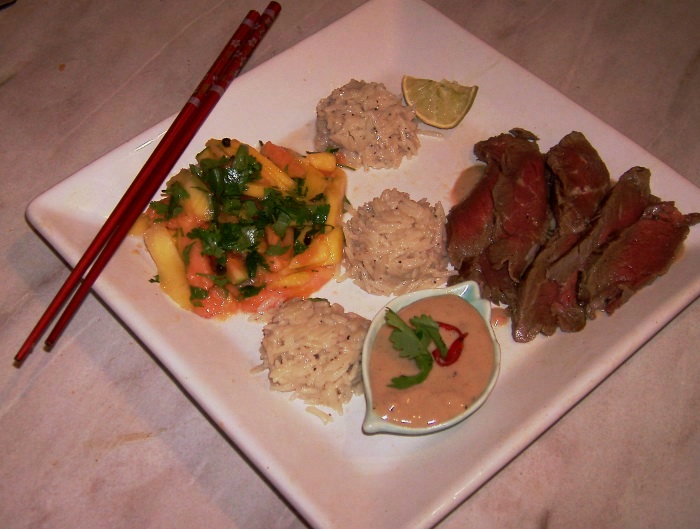 beef sashimi, coconut rice, peanut sauce mango and papaya salad